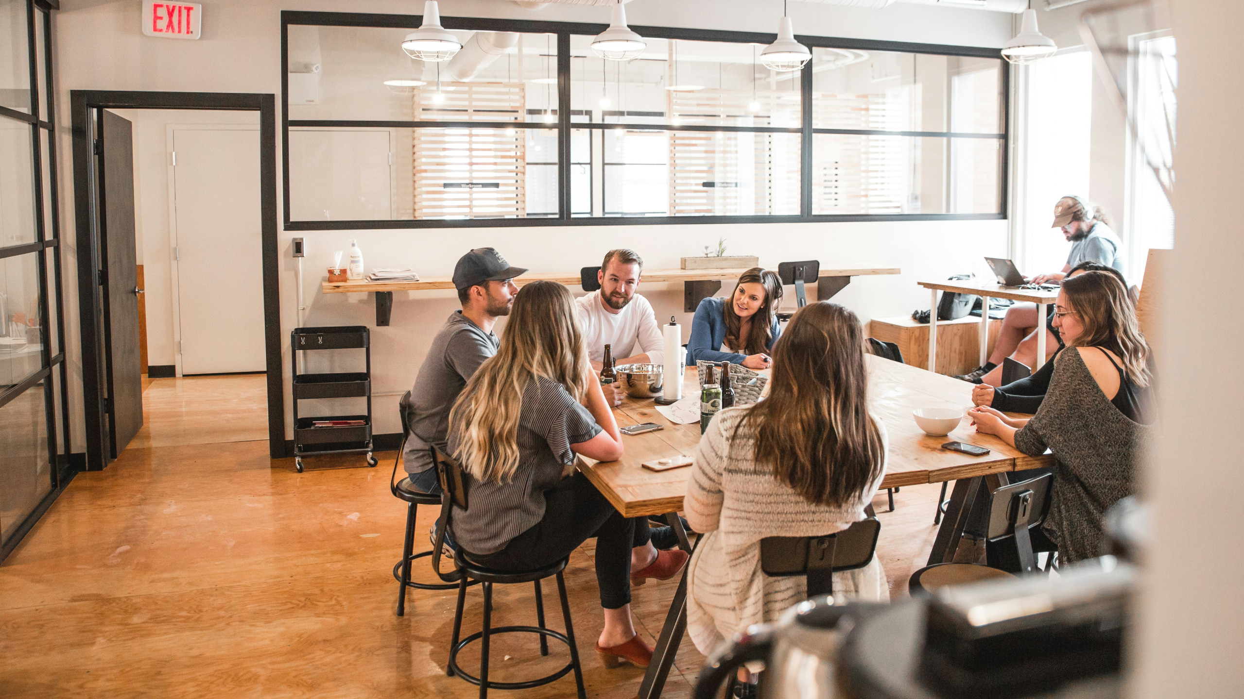 Picture of a group of people discussing a project